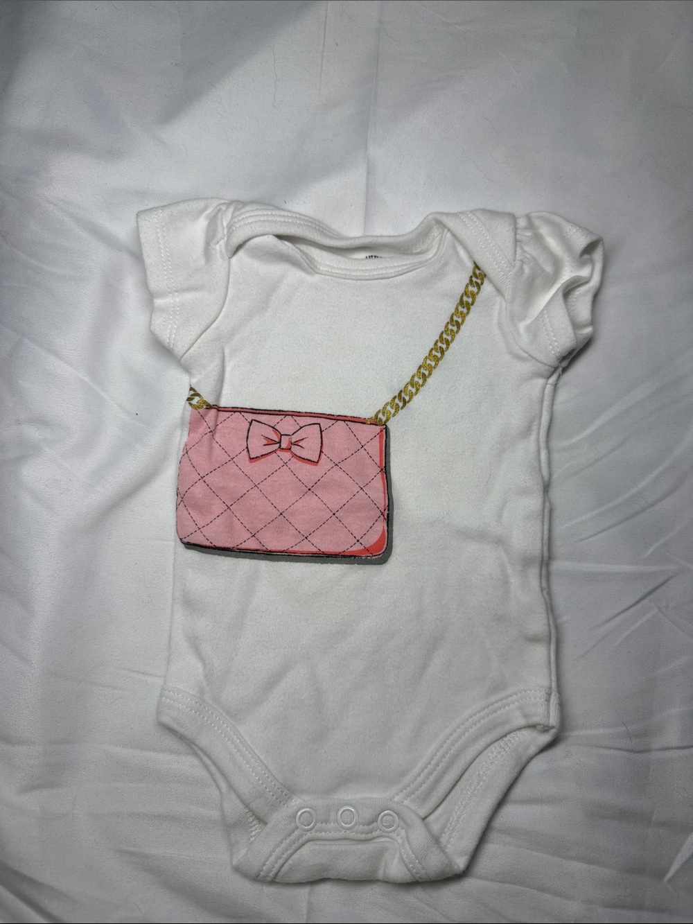 White Baby Onesie with Pink Purse Graphic newborn